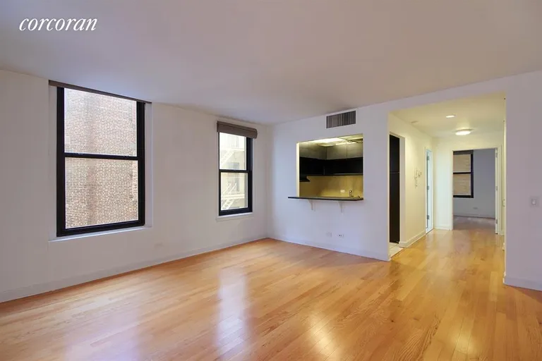 New York City Real Estate | View 56 Pine Street, 11A | Living room looking back to kitchen and hall | View 2