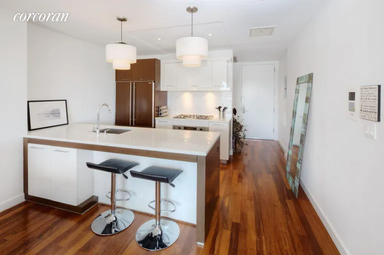 New York City Real Estate | View 125 North 10th Street, SPHF | Modern & Open Kitchen with Large Breakfast Bar | View 2