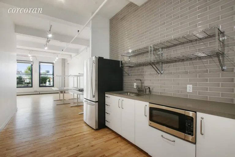 New York City Real Estate | View 110 Greene Street, 901 | New pantry and lavatory | View 2