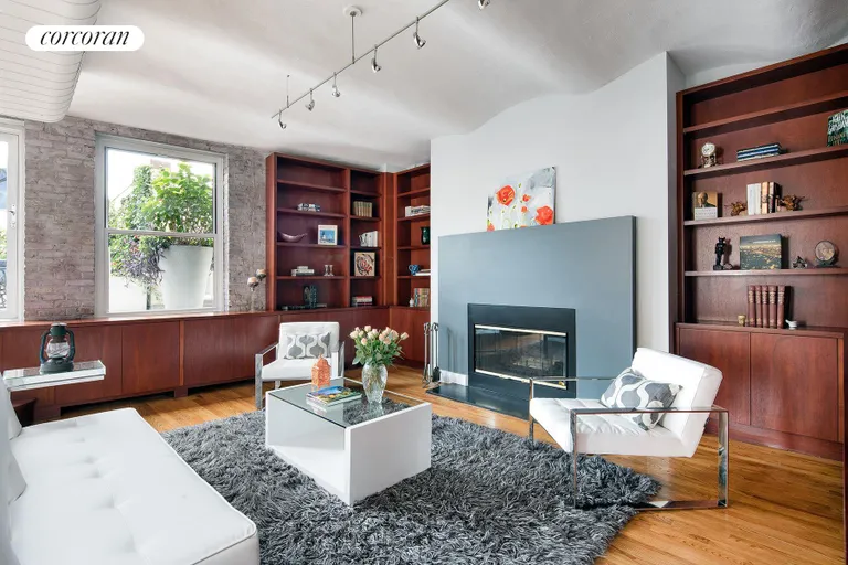 New York City Real Estate | View 429 Greenwich Street, 6C | Family Room - Library | View 2