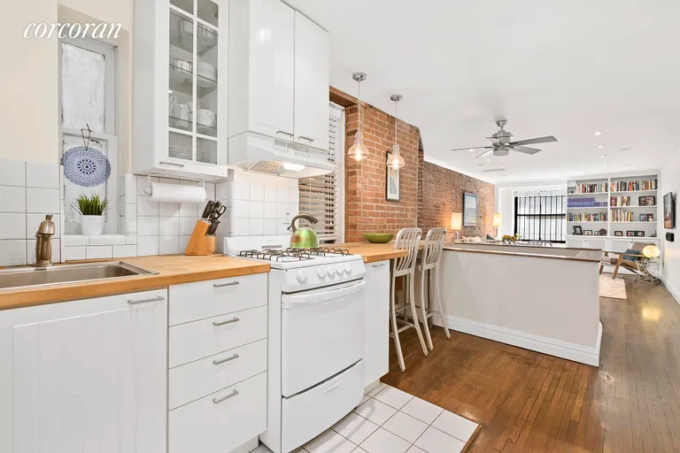 New York City Real Estate | View 15 Jones Street, 1E | Modern, Clean Kitchen Open to Living Area | View 2