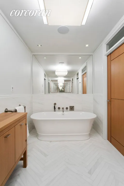New York City Real Estate | View 71 Laight Street, 3F | Soaking tub by Lefroy Brooks and custom vanity | View 8