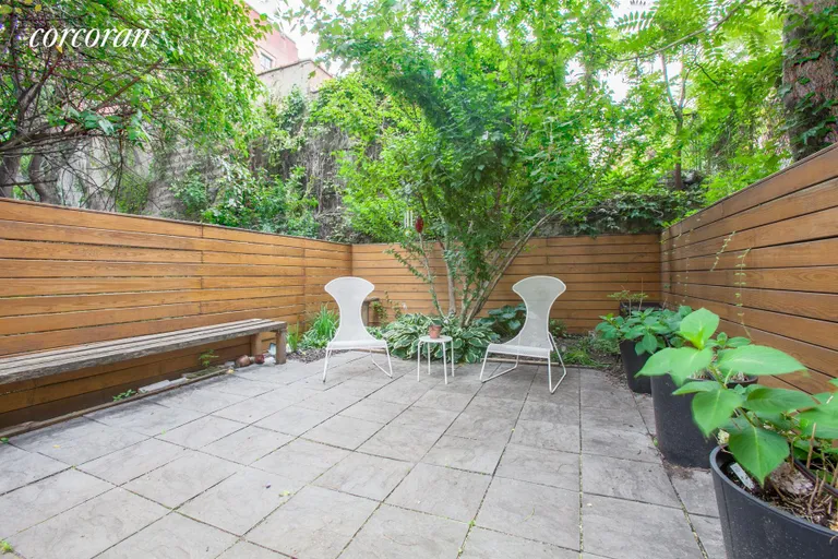 New York City Real Estate | View 489 Montgomery Street, 2F | Great shared outdoor space with BBQ  | View 8