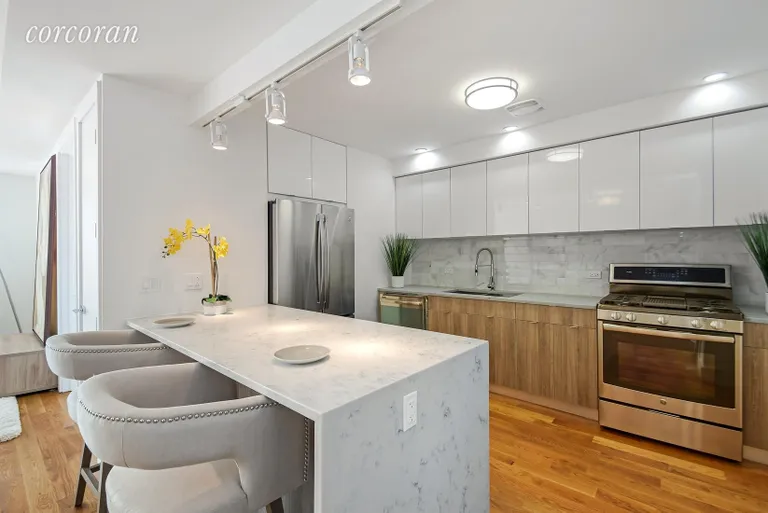 New York City Real Estate | View 781 East 9th Street, 6A | Quartz cascading countertop - Kitchen | View 3