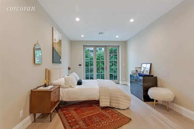 New York City Real Estate | View 132 Cambridge Place, 2 | Master Bedroom with Juliet Balcony & En Suite | View 5
