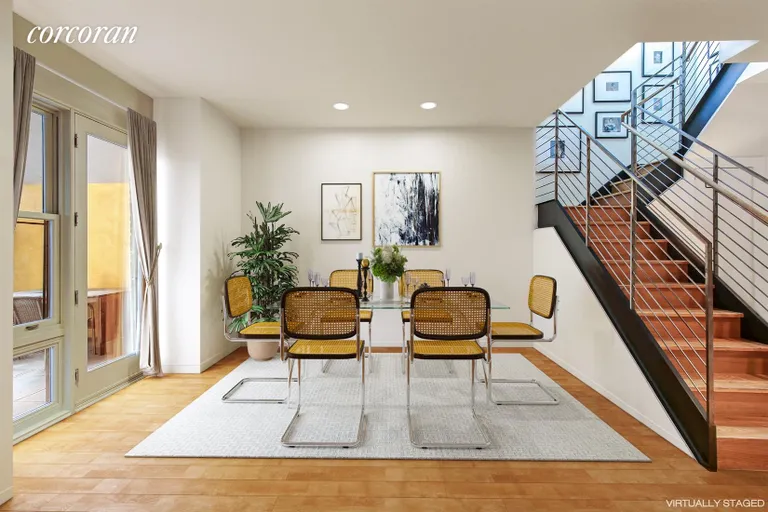 New York City Real Estate | View 101 Warren Street, A-1E | Dining room adjacent to private outdoor space | View 11