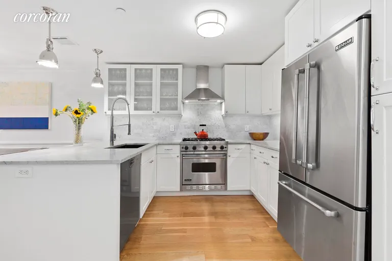New York City Real Estate | View 862 Carroll Street, 1 | Modern kitchen with stainless appliances | View 3