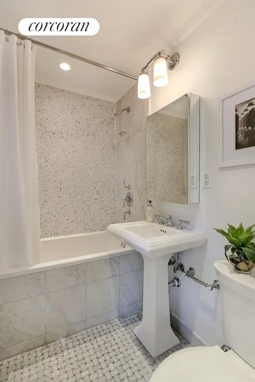 New York City Real Estate | View 865 United Nations Plaza, 1E | Beautiful Marble Bathroom | View 4