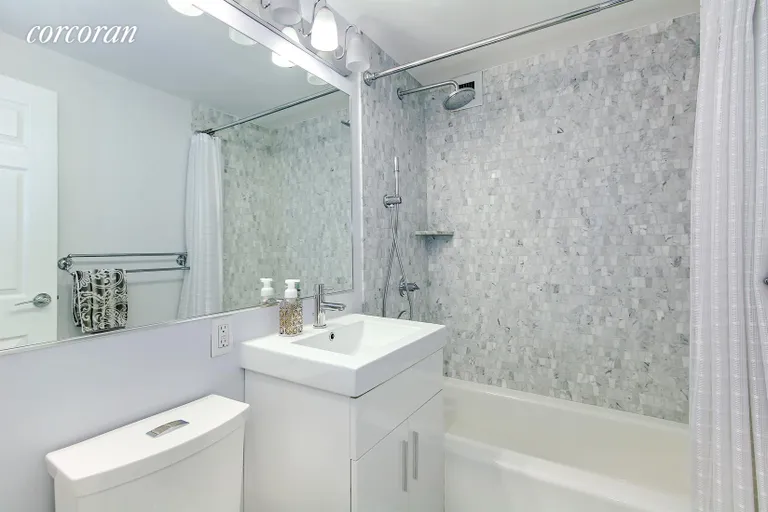 New York City Real Estate | View 340 East 80th Street, PHV | New Bathroom with Grohe showerhead | View 7