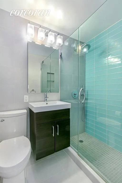 New York City Real Estate | View 340 East 80th Street, PHV | New Bathroom with Grohe showerhead | View 8