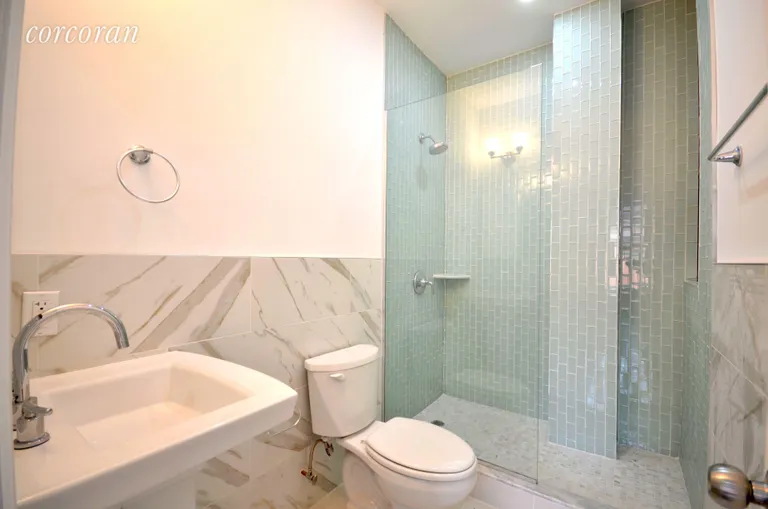 New York City Real Estate | View 11 Varick Street, 4S | Luxurious bathroom with walk in shower | View 4