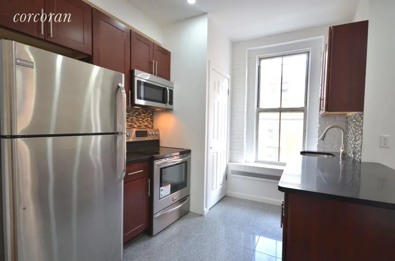 New York City Real Estate | View 11 Varick Street, 4S | Brand new kitchen with stainless steel appliances. | View 2