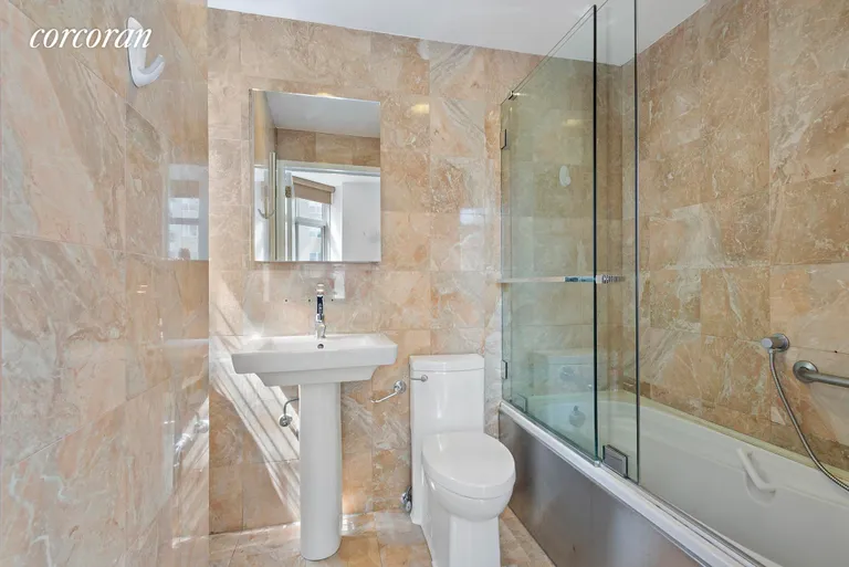 New York City Real Estate | View 188 East 64th Street, 902 | Clean, luxurious marble!  | View 5