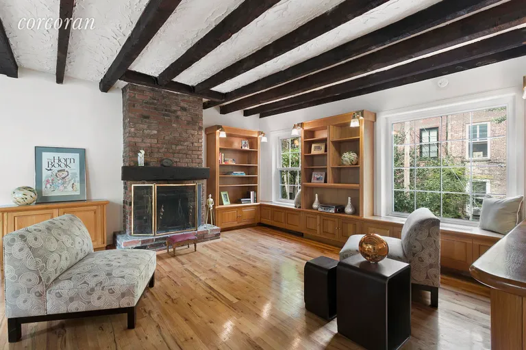 New York City Real Estate | View 20 Verandah Place | Living Room with Wood Burning Fireplace | View 4