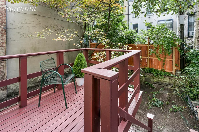 New York City Real Estate | View 20 Verandah Place | Deck Overlooks Tranquil Yard | View 6
