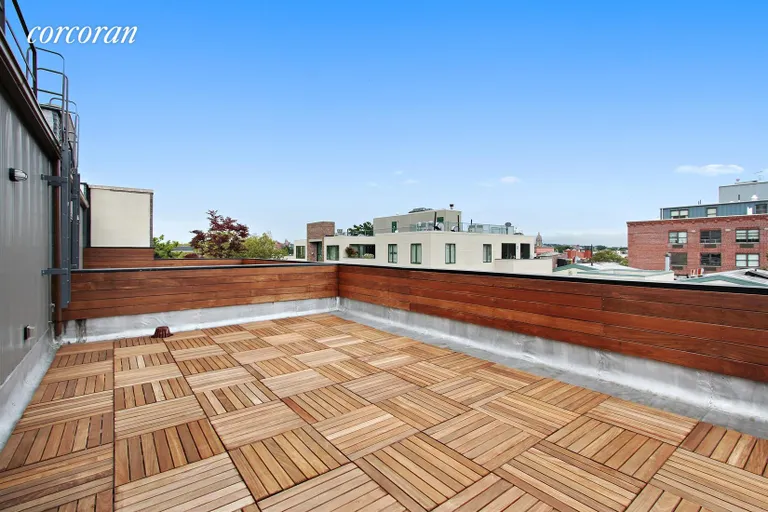 New York City Real Estate | View 43 Dean Street | Roof deck with wood decking and trim | View 18