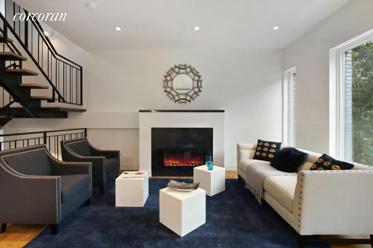 New York City Real Estate | View 43 Dean Street | Living room with gas fireplace | View 4