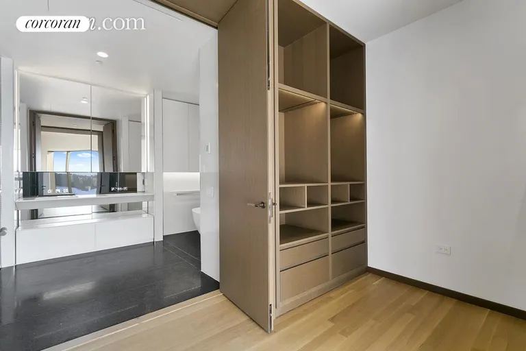 New York City Real Estate | View 551 West 21st Street, 7A | Master Bath and Closet | View 11