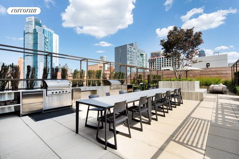 New York City Real Estate | View 265 State Street, 1013 | Common roof deck with outdoor kitchen | View 10