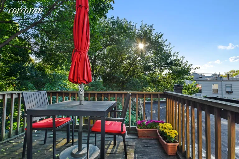 New York City Real Estate | View 110 Clinton Avenue, 3B | Deck with Tree-Top Views | View 5