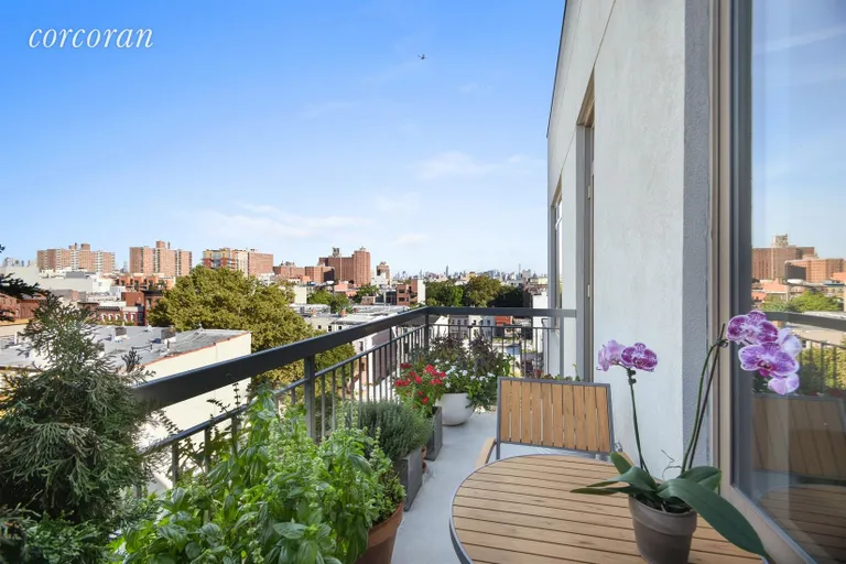 New York City Real Estate | View 315 Gates Avenue, 6S | Private balcony with skyline views | View 6