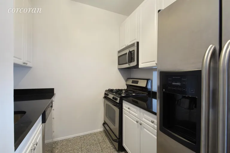 New York City Real Estate | View 301 West 57th Street, 40D | Kitchen with Pass Thru | View 4