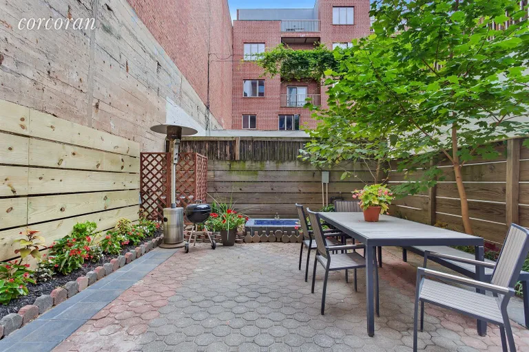 New York City Real Estate | View 392 14th Street, 1B | Lovely landscaped backyard with patio | View 5