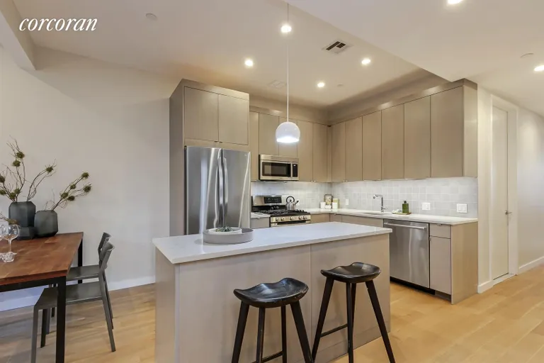 New York City Real Estate | View 755 Hart Street, 1 | Designer Kitchen w Movable Island | View 3
