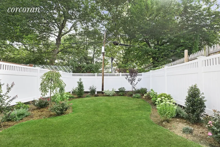 New York City Real Estate | View 27 East 4th Street | Professionally landscaped backyard oasis with deck | View 8