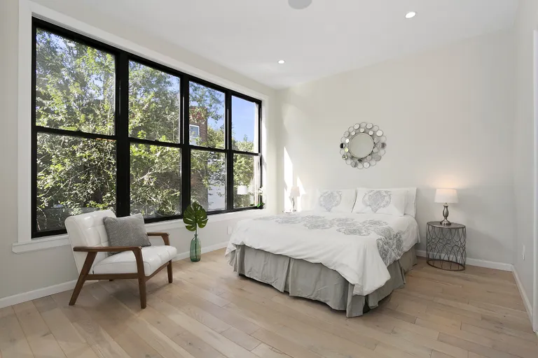 New York City Real Estate | View 1314 Bushwick Avenue | Master Bedroom with Treetop Views | View 5