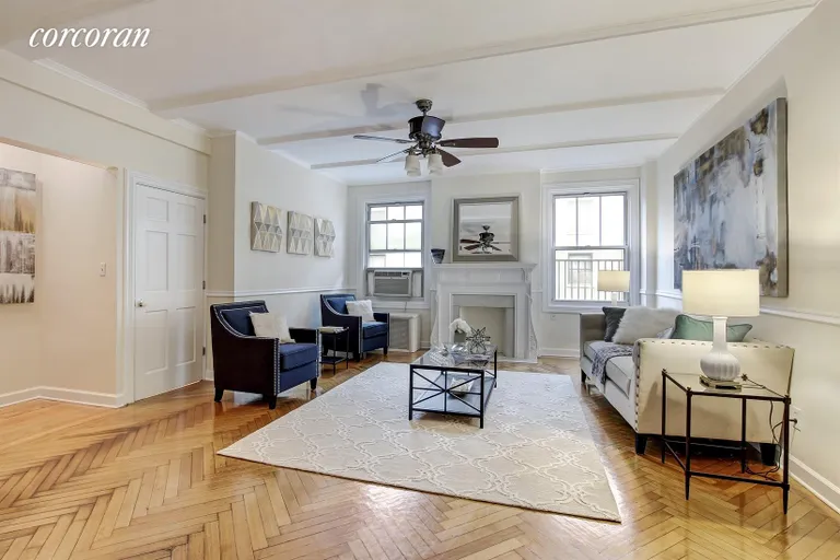 New York City Real Estate | View 140 West 71st Street, 5BC | Living Room with decorative fireplace | View 2