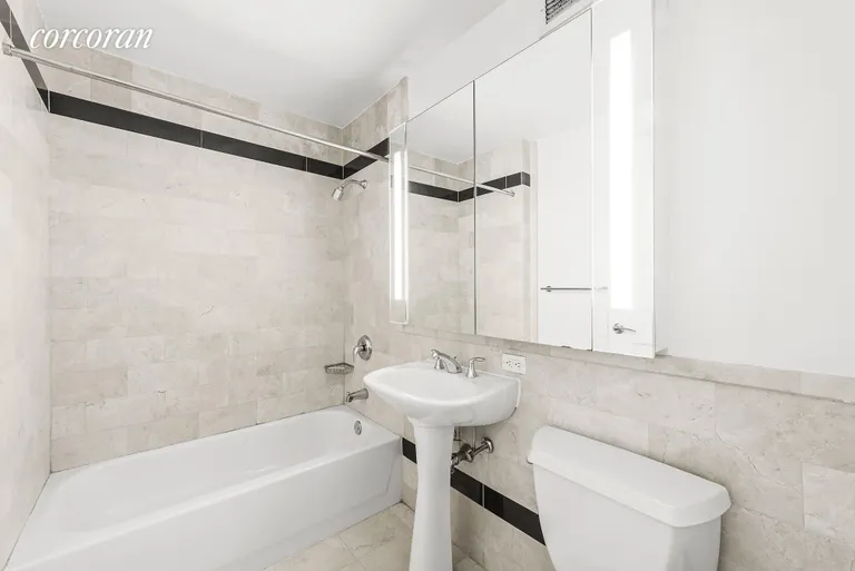 New York City Real Estate | View 20 West Street, 17L | Beautiful Bathroom with Tub and Shower | View 4