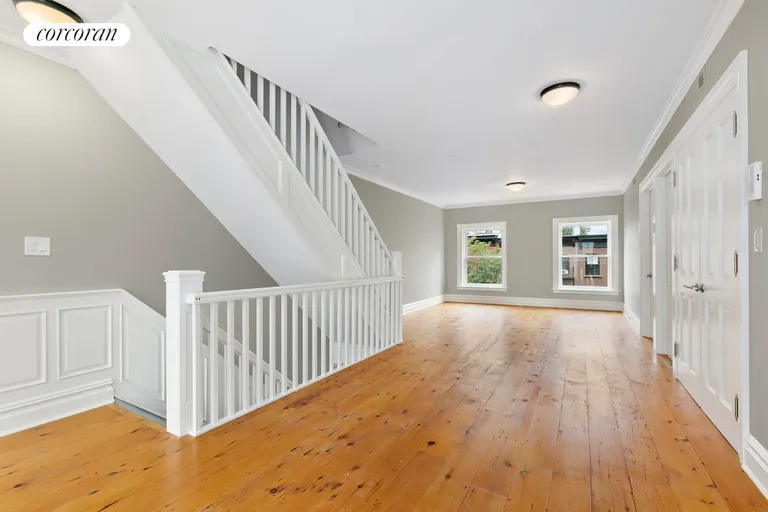 New York City Real Estate | View 15 Tompkins Place | Family room | View 10