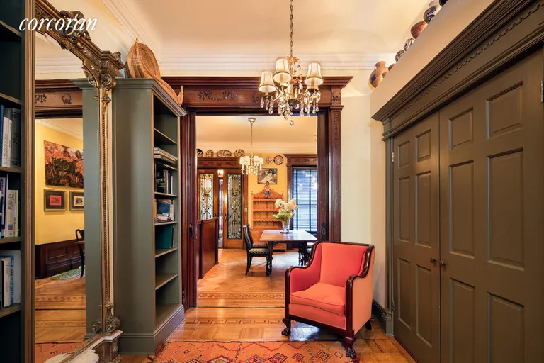New York City Real Estate | View 106 Prospect Park West, 1 | Library with built-in book shelves | View 3