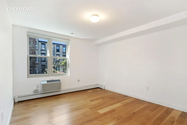 New York City Real Estate | View 714 Sackett Street, 2F | Master bedroom with garden views | View 7