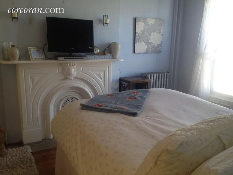 New York City Real Estate | View 179 Lafayette Avenue, 2 | Bedroom with decorative Mantle | View 5