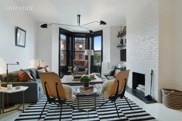 New York City Real Estate | View 749 Union Street, 3L | Dramatic bay window and wood burning fireplace  | View 2