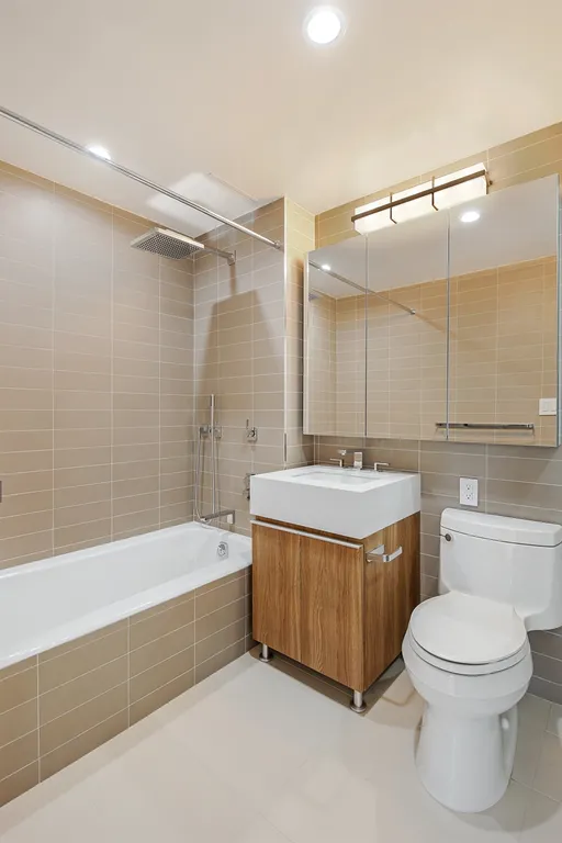 New York City Real Estate | View 20 East 68th Street, 16B | Renovated Master Bathroom | View 4