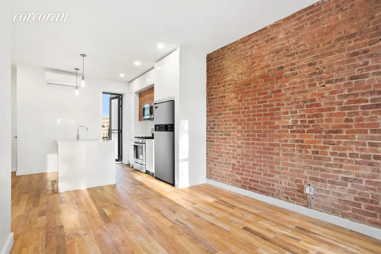 New York City Real Estate | View 343 Marlborough Road, 3 | Open and airy living room/ kitchen with balcony | View 2