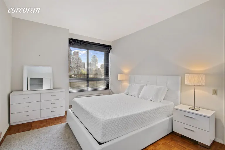 New York City Real Estate | View 100 United Nations Plaza, 15F | Bedroom with ensuite marble bath | View 2