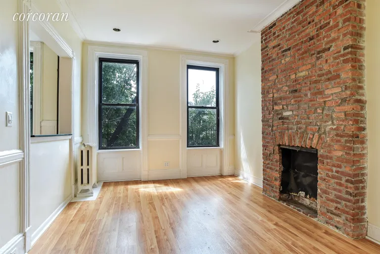 New York City Real Estate | View 590 10th Street | Exposed brick and decorative fireplaces add charm | View 5