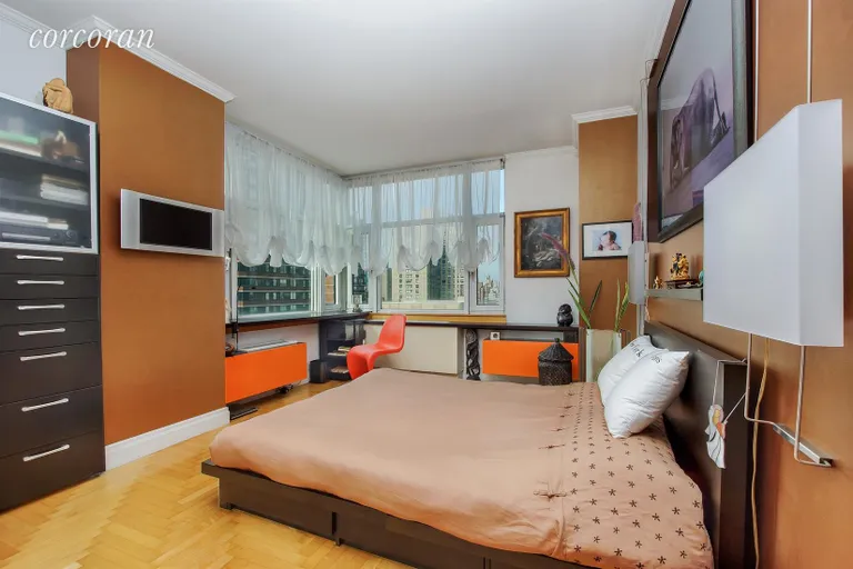 New York City Real Estate | View 404 East 76th Street, 22C | West and South Facing Master Bedroom | View 3