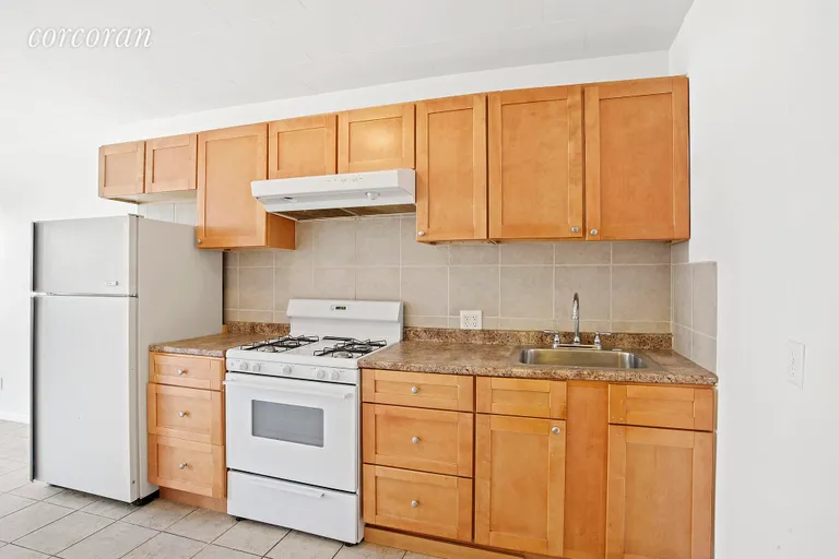 New York City Real Estate | View 1272 Prospect Avenue | Eat-in kitchen in income-producing unit | View 5