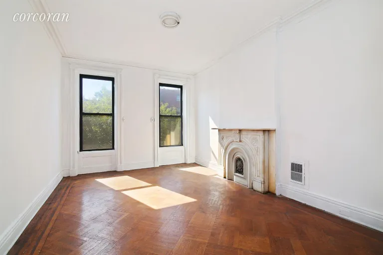 New York City Real Estate | View 86 Hancock Street | Bedroom w/ Original In Laid Floors & Marble Mantel | View 7