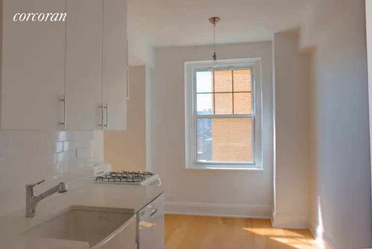New York City Real Estate | View 172 West 79th Street, 15F | South facing windowed kitchen with dining alcove | View 5