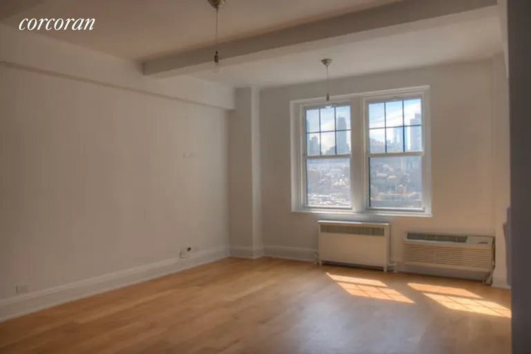 New York City Real Estate | View 172 West 79th Street, 15F | Living room with south city views | View 3