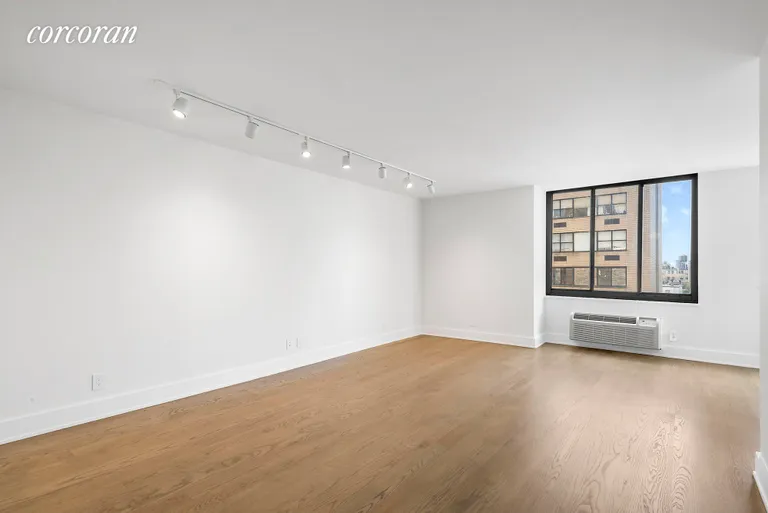 New York City Real Estate | View 115 East 87th Street, 18B | Large Living Room with Walk-in-Closet | View 2