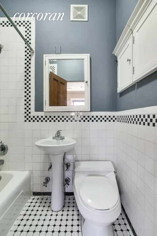 New York City Real Estate | View 19 7th Avenue, 3R | High ceiling tiled bathroom with storage | View 4