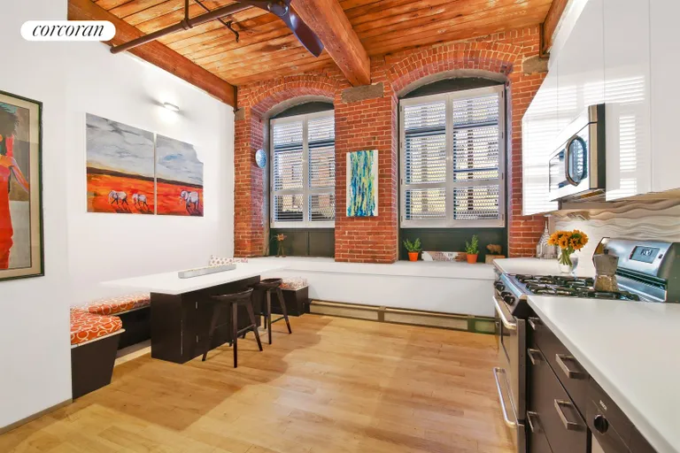 New York City Real Estate | View 420 12th Street, J1R | Eat in windowed kitchen | View 3