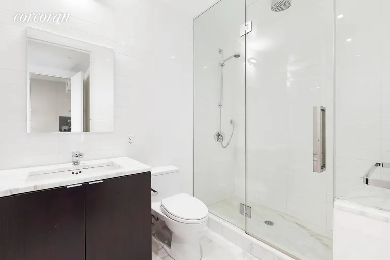 New York City Real Estate | View 101 Warren Street, 840 | Rain shower and separate soaking tub in Master . | View 5